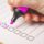 a person's hand using a pink highlighter to mark off a checklist